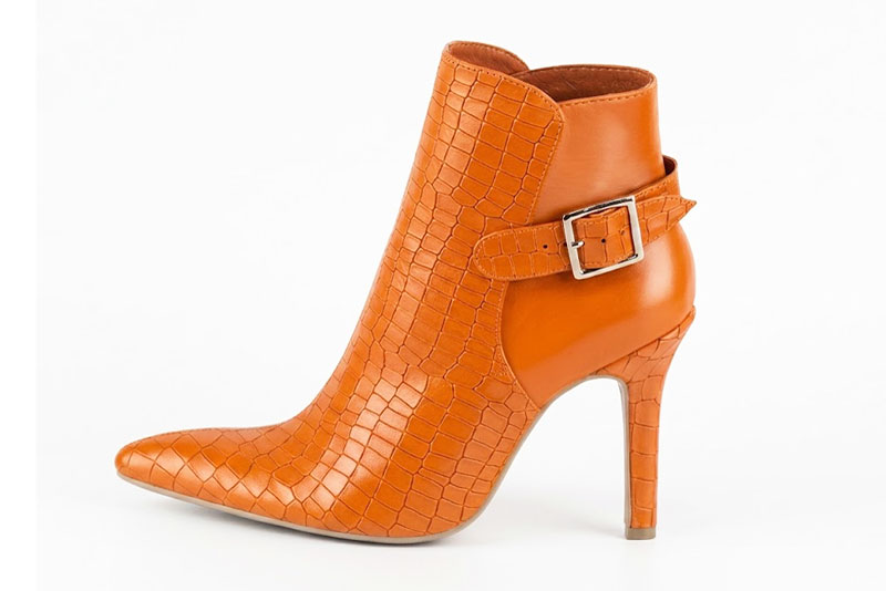 Dress ankle boots back buckles in apricot orange leather with high slim heels and tapered toe - Profile view